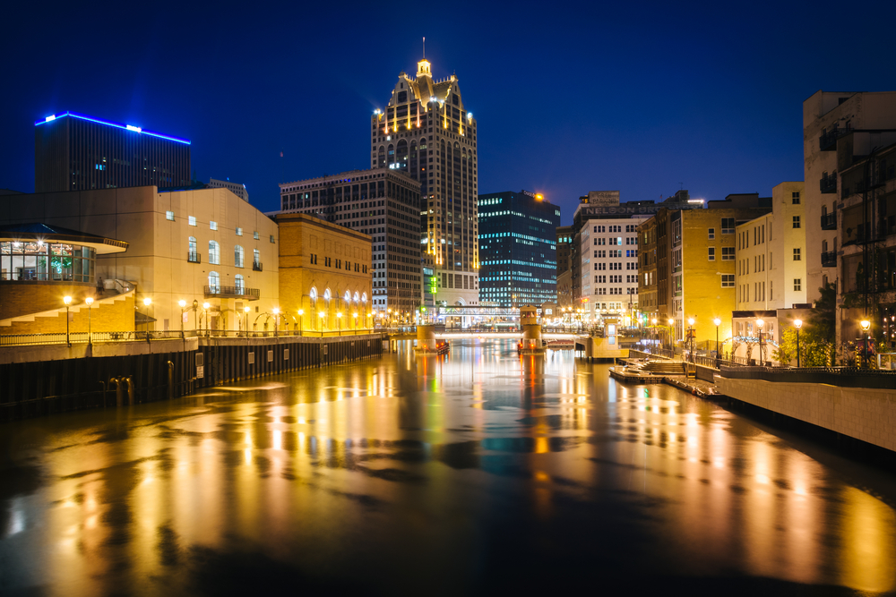 Buildings along the Milwaukee River at night, in Milwaukee, Wisconsin.